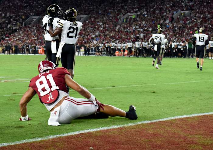 Alabama Crimson Tide tight end Cameron Latu (81) reacts after suffering an apparent injury against the Vanderbilt Commodores at Bryant-Denny Stadium.